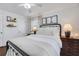 Cozy bedroom with a full-length mirror and hardwood floors at 390 Cascade Nw Dr, Marietta, GA 30064