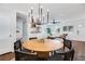 Bright dining room with round table and chandelier at 390 Cascade Nw Dr, Marietta, GA 30064