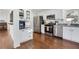 Modern kitchen with stainless steel appliances and hardwood floors at 390 Cascade Nw Dr, Marietta, GA 30064