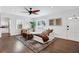 Living room with hardwood floors, white walls, and comfy seating at 390 Cascade Nw Dr, Marietta, GA 30064