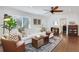 Spacious living room featuring a comfy white couch and wooden coffee table at 390 Cascade Nw Dr, Marietta, GA 30064