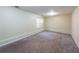 Simple bedroom with neutral walls and carpet flooring at 476 Cody Ln, Douglasville, GA 30134