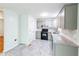 Kitchen with granite countertops and gray cabinets at 476 Cody Ln, Douglasville, GA 30134