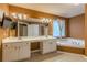 Bathroom boasts double vanities, a large soaking tub, and a separate shower at 1411 Splitrock Sw Pl, Atlanta, GA 30331