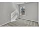 Spacious bedroom with window and carpet flooring at 4336 Mallory Ct, Union City, GA 30291