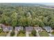 Aerial view of homes nestled in a wooded neighborhood at 1450 Grovehurst Dr, Marietta, GA 30062