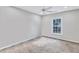 Spacious bedroom with neutral walls and carpet at 1450 Grovehurst Dr, Marietta, GA 30062