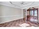 Formal dining room with hardwood floors and a lovely hutch at 1450 Grovehurst Dr, Marietta, GA 30062