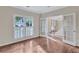 Spacious home office with hardwood floors and French doors leading to other rooms at 1450 Grovehurst Dr, Marietta, GA 30062