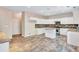 Eat-in kitchen with island, granite counters, and white cabinets at 1450 Grovehurst Dr, Marietta, GA 30062