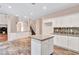 Kitchen with island, granite counters, and hardwood floors at 1450 Grovehurst Dr, Marietta, GA 30062