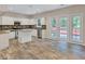 Kitchen with island, stainless steel appliances, and deck access at 1450 Grovehurst Dr, Marietta, GA 30062