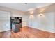 Home office with built-in shelving and hardwood floors at 1450 Grovehurst Dr, Marietta, GA 30062