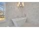 Bathroom with freestanding soaking tub and large shower at 1565 Pineview Terrace Sw, Atlanta, GA 30311