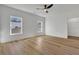 Well-lit bedroom with hardwood floor and walk-in closet at 1565 Pineview Terrace Sw, Atlanta, GA 30311