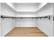 Large walk-in closet with ample shelving and hanging space at 1565 Pineview Sw Ter, Atlanta, GA 30311