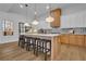 Modern kitchen with large island, custom cabinetry, and stainless steel appliances at 1565 Pineview Terrace Sw, Atlanta, GA 30311