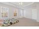 Well-lit bedroom with ceiling fan and windows at 2428 Bridlewood Se Dr # 24, Atlanta, GA 30339