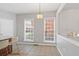 Breakfast nook with tile flooring and large windows at 2428 Bridlewood Se Dr # 24, Atlanta, GA 30339