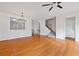 Bright living room featuring hardwood floors and an open staircase at 2428 Bridlewood Se Dr # 24, Atlanta, GA 30339