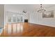 Bright living room with hardwood floors, fireplace, and access to balcony at 2428 Bridlewood Se Dr # 24, Atlanta, GA 30339