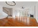 Spacious living room with hardwood floors, staircase, fireplace, and natural light at 2428 Bridlewood Se Dr # 24, Atlanta, GA 30339