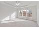 Airy main bedroom featuring trey ceiling and large windows at 2428 Bridlewood Se Dr # 24, Atlanta, GA 30339