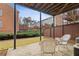 Covered patio with comfortable seating area at 2428 Bridlewood Se Dr # 24, Atlanta, GA 30339