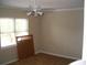 Bedroom with ceiling fan and neutral walls at 306 Flagstone Way # 306, Austell, GA 30168