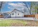 Backyard view of house with gravel landscaping and deck at 3935 Admiral Dr, Chamblee, GA 30341