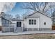 Exterior view of the house with gray siding and a deck at 3935 Admiral Dr, Chamblee, GA 30341