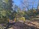 View from deck of a wooded backyard with trees at 425 Hilderbrand Dr, Sandy Springs, GA 30328