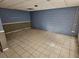 Unfinished basement with tiled floor at 425 Hilderbrand Dr, Sandy Springs, GA 30328