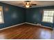 Bedroom with hardwood floors and teal walls at 425 Hilderbrand Dr, Sandy Springs, GA 30328