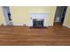 Living room with hardwood floors and a fireplace at 425 Hilderbrand Dr, Sandy Springs, GA 30328