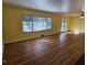 Spacious living room with hardwood floors and multiple windows at 425 Hilderbrand Dr, Sandy Springs, GA 30328