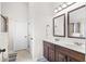 Double vanity bathroom with dark wood cabinets and a separate shower at 502 Starling View Cir, Grayson, GA 30017