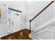 Elegant entryway with hardwood floors and stairs to the second floor at 502 Starling View Cir, Grayson, GA 30017