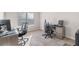 Spacious home office with two desks and ample natural light at 502 Starling View Cir, Grayson, GA 30017