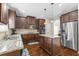 Modern kitchen with stainless steel appliances and granite countertops at 502 Starling View Cir, Grayson, GA 30017