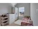 Charming bedroom with a twin-size bed and plenty of storage at 6460 Dove Dr, Loganville, GA 30052