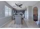 Bright dining room adjacent to the kitchen with gray chairs and a gray table at 6460 Dove Dr, Loganville, GA 30052