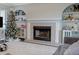 Fireplace with built-in shelving and decorative mantle at 6460 Dove Dr, Loganville, GA 30052