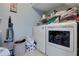 Laundry room with washer, dryer, and additional storage at 6460 Dove Dr, Loganville, GA 30052