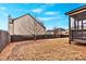 Large backyard with grassy area and wooden fence at 845 Nevis Way, Mcdonough, GA 30253