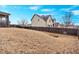 Landscaped backyard with grassy area and wooden fence at 845 Nevis Way, Mcdonough, GA 30253
