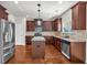 Modern kitchen featuring stainless steel appliances and an island at 845 Nevis Way, Mcdonough, GA 30253