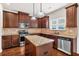 Kitchen with stainless steel appliances and granite countertops at 845 Nevis Way, Mcdonough, GA 30253