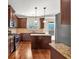Open concept kitchen with island and stainless steel appliances at 845 Nevis Way, Mcdonough, GA 30253