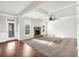 Bright living room featuring hardwood and carpet flooring at 845 Nevis Way, Mcdonough, GA 30253